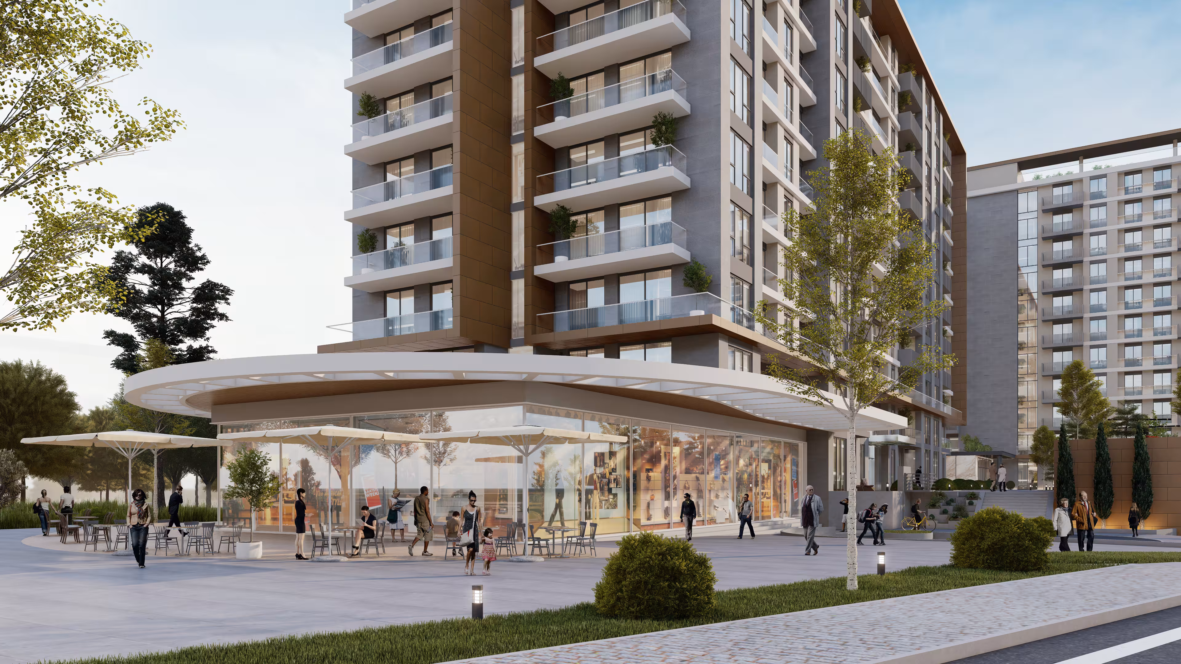 Valory Güneşli commercial area and plaza entrance - glass facade design, outdoor seating areas and social activity center