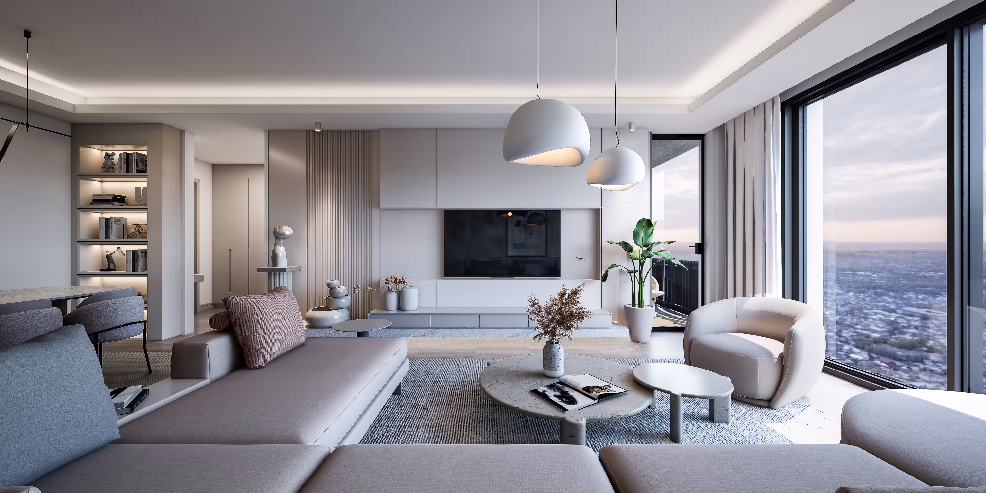 Valory Güneşli 3+1 apartment living room overview — large TV unit, sitting area and city-view balcony.